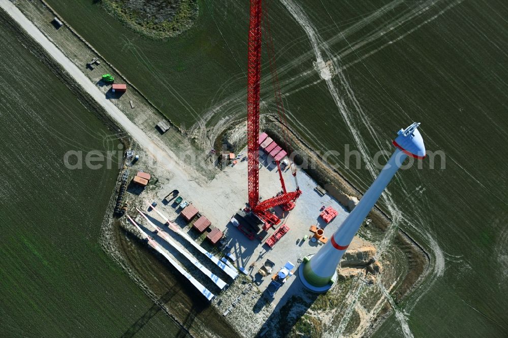 Niedergörsdorf from the bird's eye view: Construction site for wind turbine installation on a field in Niedergoersdorf in the state Brandenburg, Germany