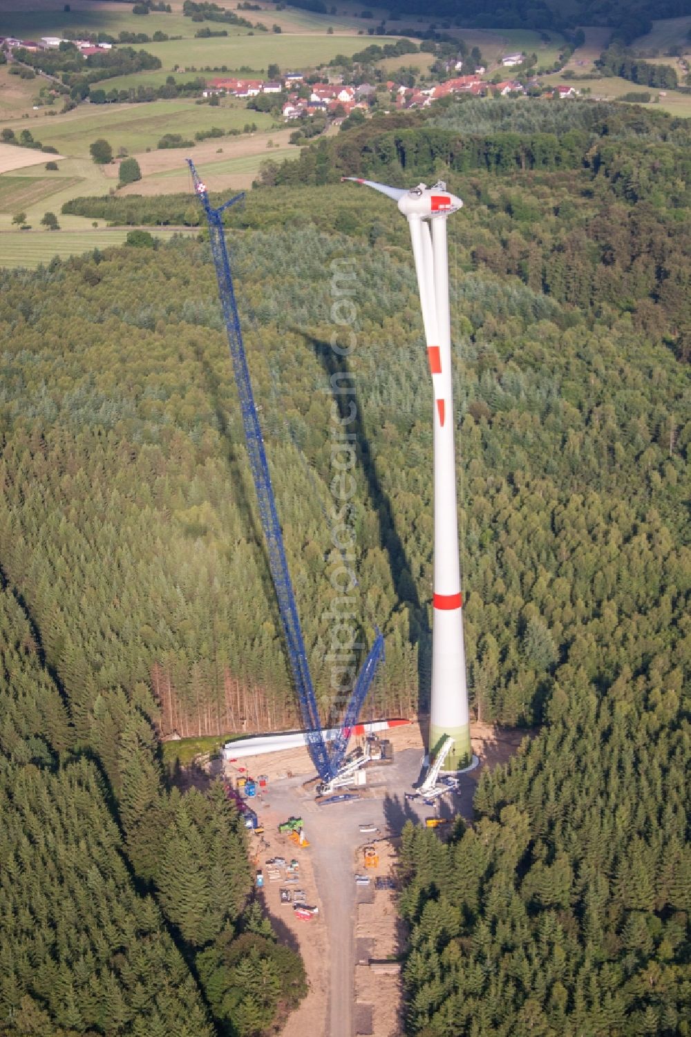 Freiensteinau from above - Construction site for wind turbine installation in Freiensteinau in the state Hesse, Germany