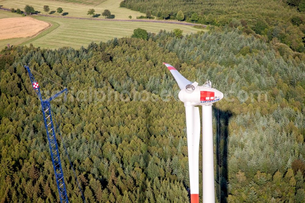 Freiensteinau from the bird's eye view: Construction site for wind turbine installation in Freiensteinau in the state Hesse, Germany