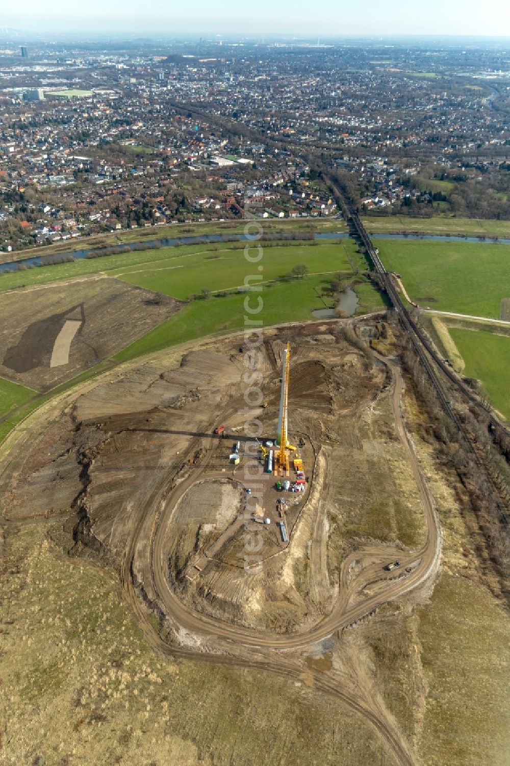 Mülheim an der Ruhr from the bird's eye view: Construction site for wind turbine installation in den Styrumer Ruhrauen in Muelheim on the Ruhr in the state North Rhine-Westphalia, Germany