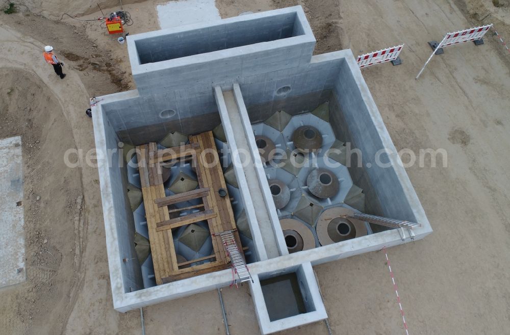 Bergen auf Rügen from the bird's eye view: New construction site and extension of the sewage treatment basins and purification stages for on additional filtration system in Bergen auf Ruegen in the state Mecklenburg - Western Pomerania, Germany