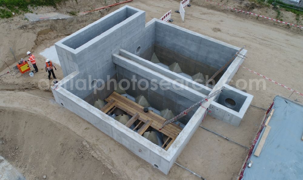 Bergen auf Rügen from above - New construction site and extension of the sewage treatment basins and purification stages for on additional filtration system in Bergen auf Ruegen in the state Mecklenburg - Western Pomerania, Germany