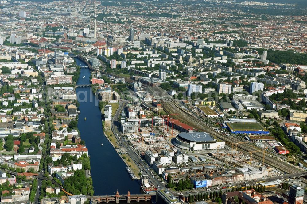 Berlin from above - Development area and construction sites on the Anschutzareal at the Mercedes-Benz-Arena on the banks of the River Spree in Friedrichshain. The Anschutz Entertainment Group (AEG) is developing the site through numerous hotel and commercial building new buildings