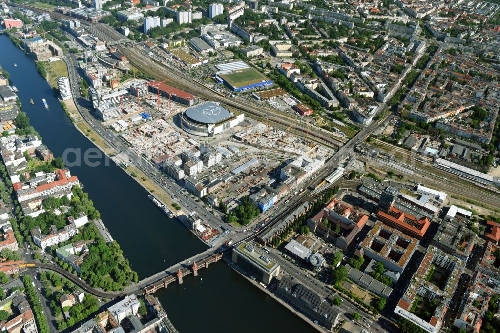 Berlin from above - Development area and construction sites on the Anschutzareal at the Mercedes-Benz-Arena on the banks of the River Spree in Friedrichshain. The Anschutz Entertainment Group (AEG) is developing the site through numerous hotel and commercial building new buildings