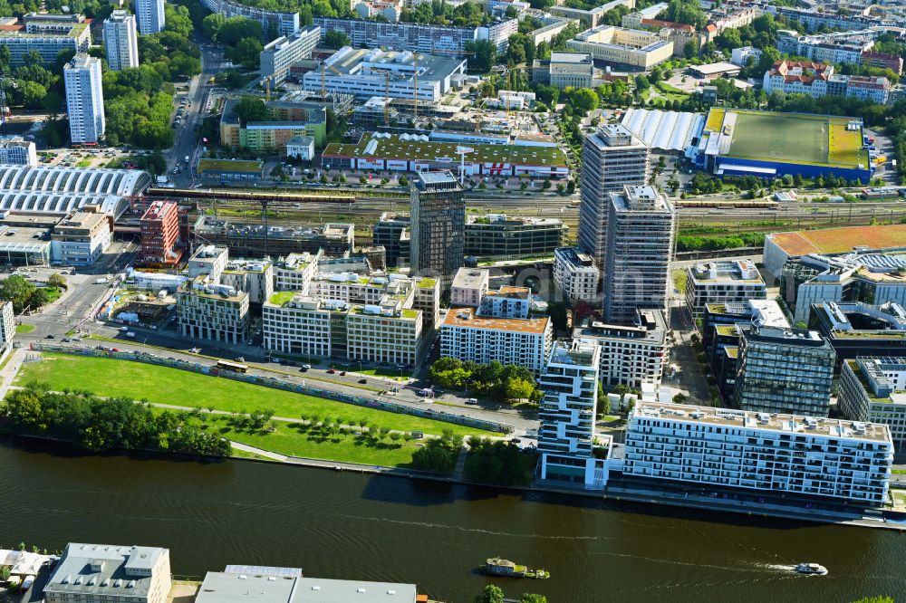 Berlin from above - Development area and construction sites on the Anschutzareal at the Uber Arena on the banks of the River Spree in Friedrichshain. The Anschutz Entertainment Group (AEG) is developing the site through numerous hotel and commercial building new buildings