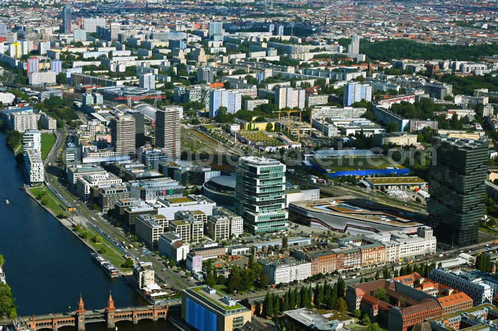 Berlin from above - Development area and construction sites on the Anschutzareal at the Uber Arena on the banks of the River Spree in Friedrichshain. The Anschutz Entertainment Group (AEG) is developing the site through numerous hotel and commercial building new buildings