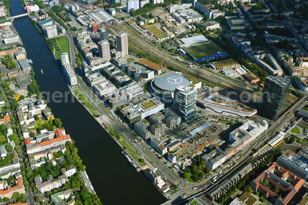 Aerial image Berlin - Development area and construction sites on the Anschutzareal at the Uber Arena on the banks of the River Spree in Friedrichshain. The Anschutz Entertainment Group (AEG) is developing the site through numerous hotel and commercial building new buildings