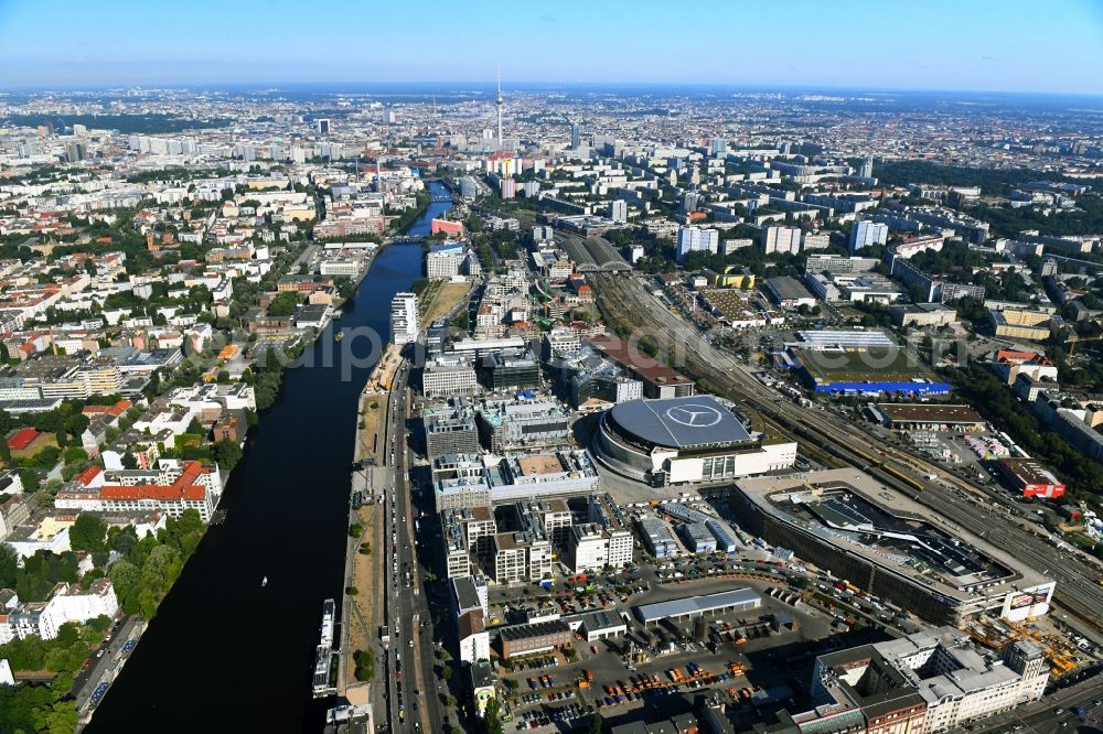 Berlin from the bird's eye view: Construction sites for the new building on Anschutz- Areal along of Muehlenstrasse in the district Friedrichshain in Berlin, Germany