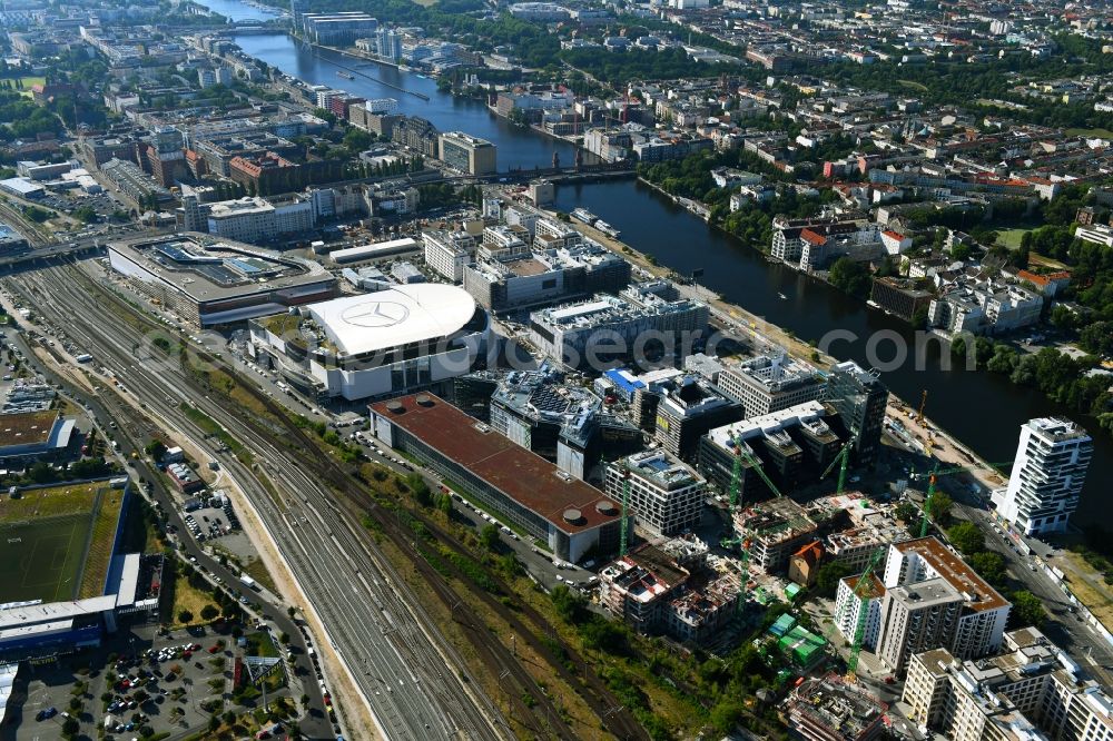 Berlin from the bird's eye view: Construction sites for the new building on Anschutz- Areal along of Muehlenstrasse in the district Friedrichshain in Berlin, Germany