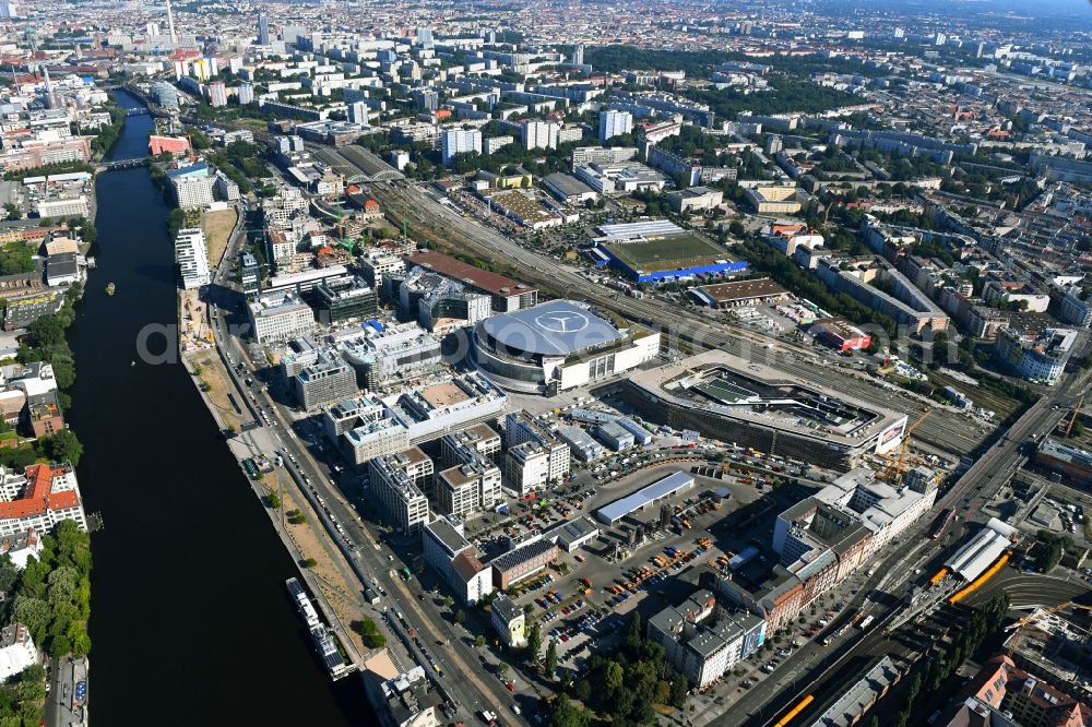 Berlin from the bird's eye view: Construction sites for the new building on Anschutz- Areal along of Muehlenstrasse in the district Friedrichshain in Berlin, Germany