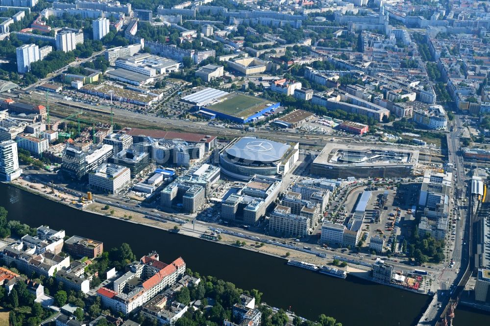 Berlin from the bird's eye view: Construction sites for the new building on Anschutz- Areal along of Muehlenstrasse in the district Friedrichshain in Berlin, Germany