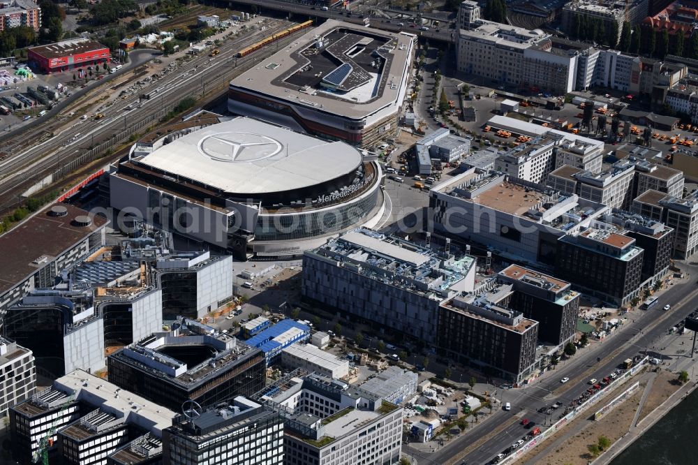 Berlin from the bird's eye view: Construction sites for the new building on Anschutz- Areal along of Muehlenstrasse in the district Friedrichshain in Berlin, Germany