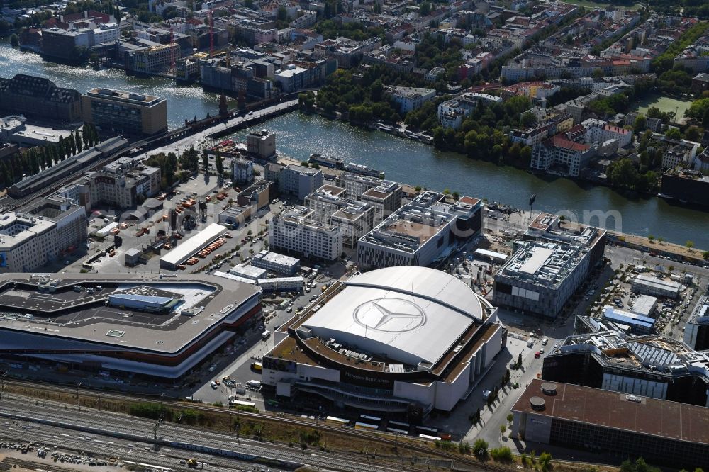 Berlin from the bird's eye view: Construction sites for the new building on Anschutz- Areal along of Muehlenstrasse in the district Friedrichshain in Berlin, Germany