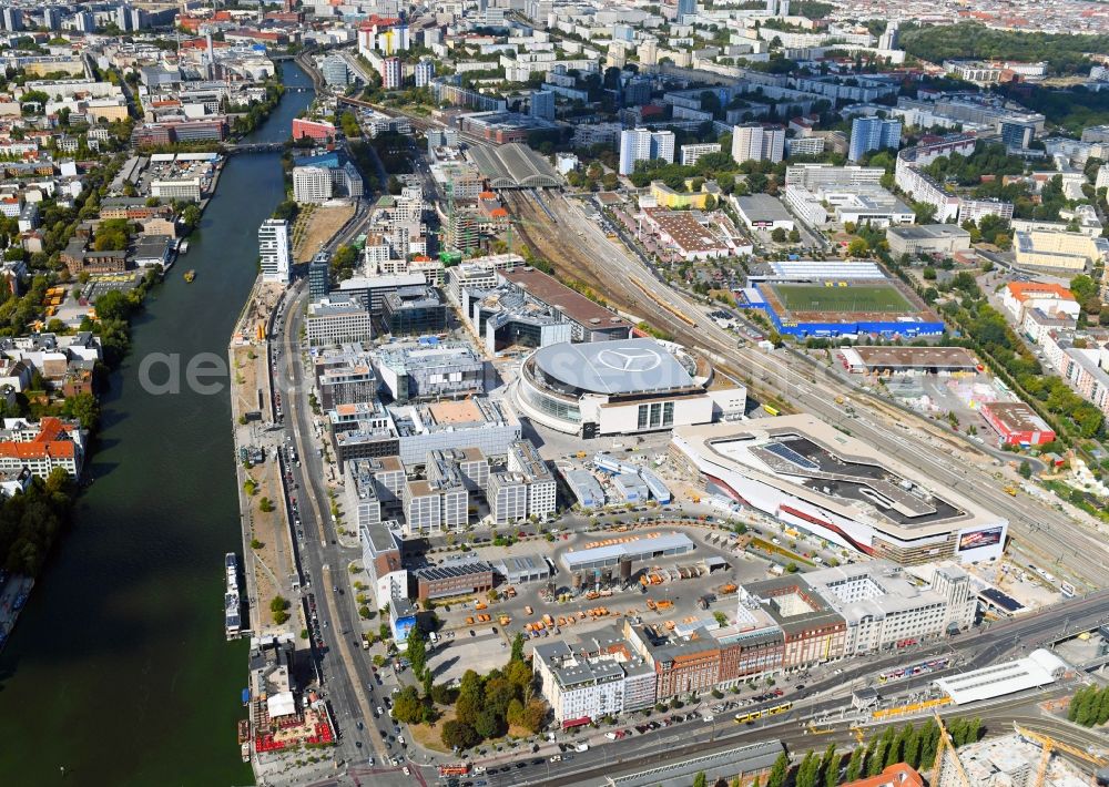 Berlin from the bird's eye view: Construction sites for the new building on Anschutz- Areal along of Muehlenstrasse in the district Friedrichshain in Berlin, Germany