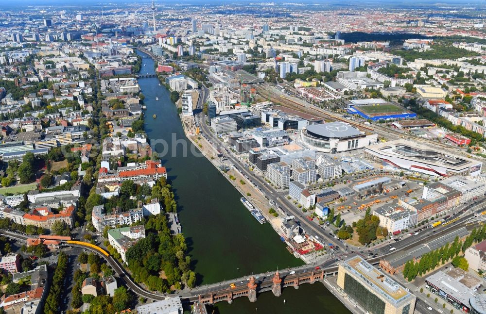 Berlin from the bird's eye view: Construction sites for the new building on Anschutz- Areal along of Muehlenstrasse in the district Friedrichshain in Berlin, Germany