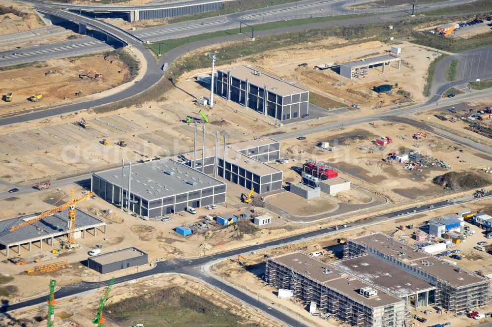 Aerial image Schönefeld bei Berlin - Blick auf die Baustellen am Flughafen Berlin-Schönefeld BBI (SXF). Ausführende Firmen: Hochtief AG; EUROVIA Beton; PORR; BERGER Bau; Karl Weiss; Matthai; Schäler Bau Berlin GmbH; STRABAG; MAX BÖGL. Construction fields at Berlin-Schoenefeld Airport BBI.