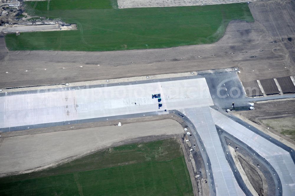 Schönefeld bei Berlin from above - Blick auf die Baustellen am Flughafen Berlin-Schönefeld BBI (SXF). Ausführende Firmen: Hochtief AG; EUROVIA Beton; PORR; BERGER Bau; Karl Weiss; Matthai; Schäler Bau Berlin GmbH; STRABAG; MAX BÖGL. Construction fields at Berlin-Schoenefeld Airport BBI.