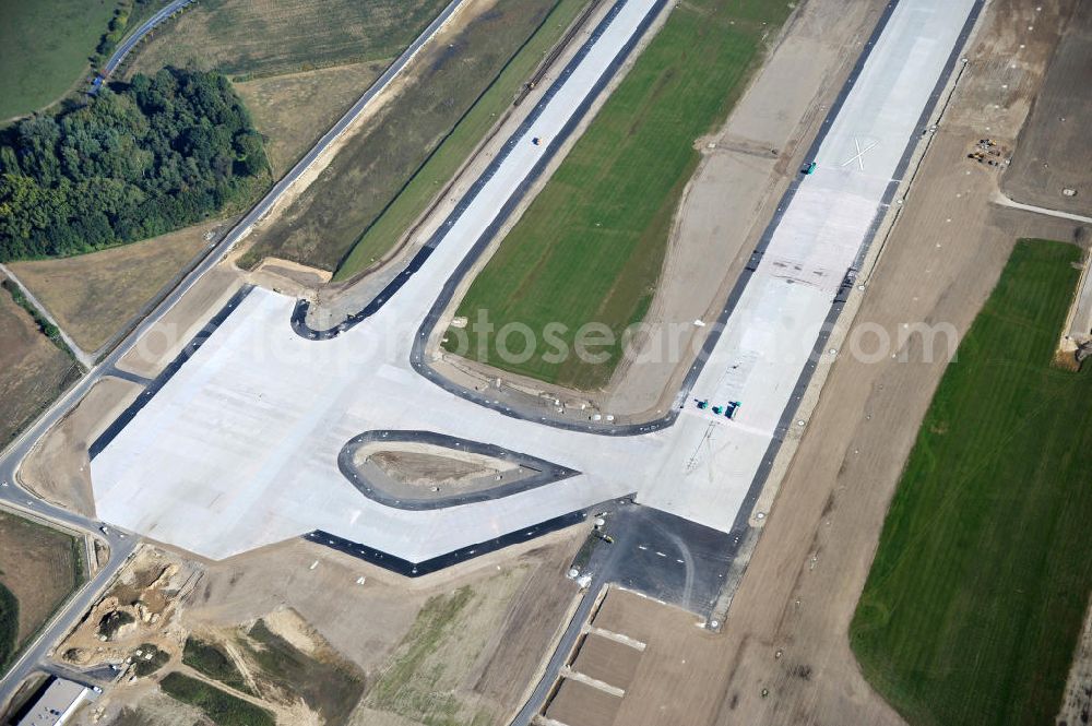 Schönefeld bei Berlin from the bird's eye view: Blick auf die Baustellen am Flughafen Berlin-Schönefeld BBI (SXF). Ausführende Firmen: Hochtief AG; EUROVIA Beton; PORR; BERGER Bau; Karl Weiss; Matthai; Schäler Bau Berlin GmbH; STRABAG; MAX BÖGL. Construction fields at Berlin-Schoenefeld Airport BBI.