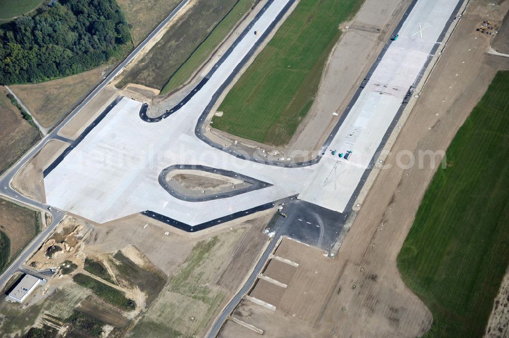 Aerial image Schönefeld bei Berlin - Blick auf die Baustellen am Flughafen Berlin-Schönefeld BBI (SXF). Ausführende Firmen: Hochtief AG; EUROVIA Beton; PORR; BERGER Bau; Karl Weiss; Matthai; Schäler Bau Berlin GmbH; STRABAG; MAX BÖGL. Construction fields at Berlin-Schoenefeld Airport BBI.