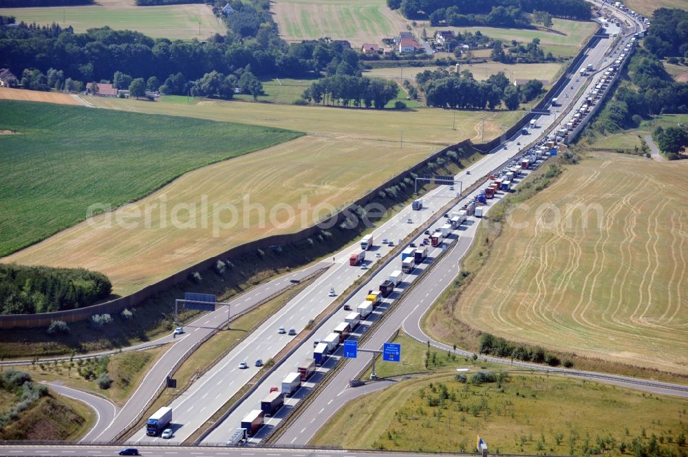 Triptis from the bird's eye view: Buildings and route of the motorway A9 motorway with four lanes now. Currently, reconstruction, expansion and new construction work is underway for the six-lane expansion of Highway 9 between Triptis and Schleiz by Wayss & Freytag Ingenieurbau and EUROVIA VINCI in Thuringia