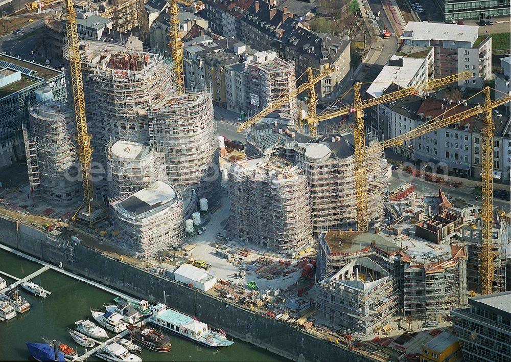 Düsseldorf from the bird's eye view: Sites for redevelopment of office and commercial buildings Gehry buildings in the Media Harbor in Dusseldorf in North Rhine-Westphalia