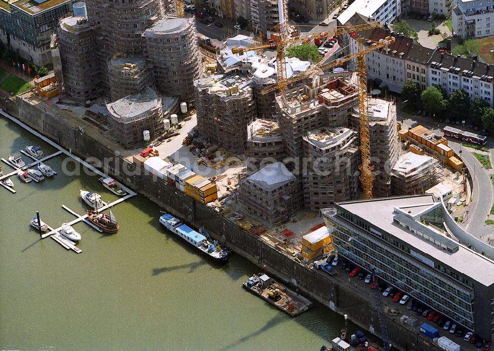 Aerial photograph Düsseldorf - Sites for redevelopment of office and commercial buildings Gehry buildings in the Media Harbor in Dusseldorf in North Rhine-Westphalia