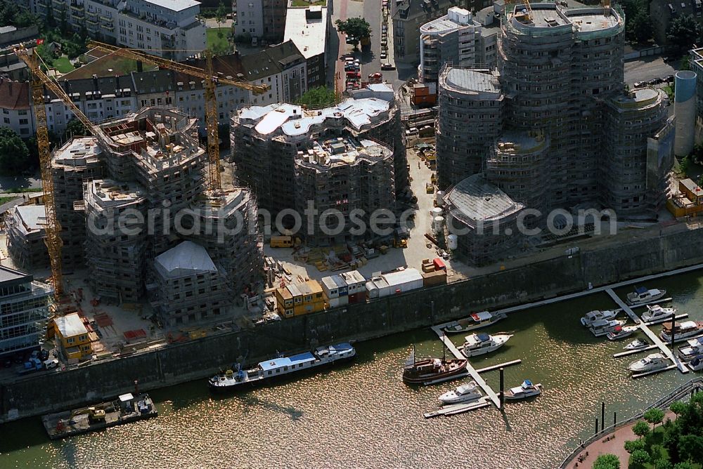 Düsseldorf from above - Sites for redevelopment of office and commercial buildings Gehry buildings in the Media Harbor in Dusseldorf in North Rhine-Westphalia