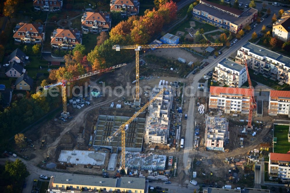 Glienicke / Nordbahn from the bird's eye view: Construction sites for new construction of multi-family and terraced houses - new buildings in the residential area of ??the NCC GmbH in Germany in Brandenburg Glienicke