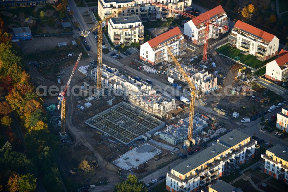 Glienicke / Nordbahn from the bird's eye view: Construction sites for new construction of multi-family and terraced houses - new buildings in the residential area of ??the NCC GmbH in Germany in Brandenburg Glienicke