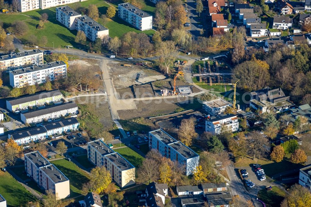 Aerial image Arnsberg - Construction sites for new construction residential area of detached housing estate with an age-appropriate retirement home on Moosfelder Ring in the district Neheim in Arnsberg at Sauerland in the state North Rhine-Westphalia, Germany