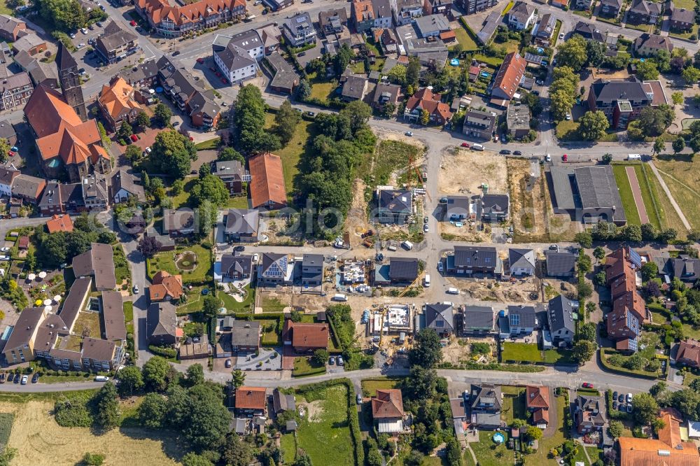 Hamm from the bird's eye view: Construction sites for new construction residential area of detached housing estate on Doerholtstrasse in Hamm in the state North Rhine-Westphalia, Germany