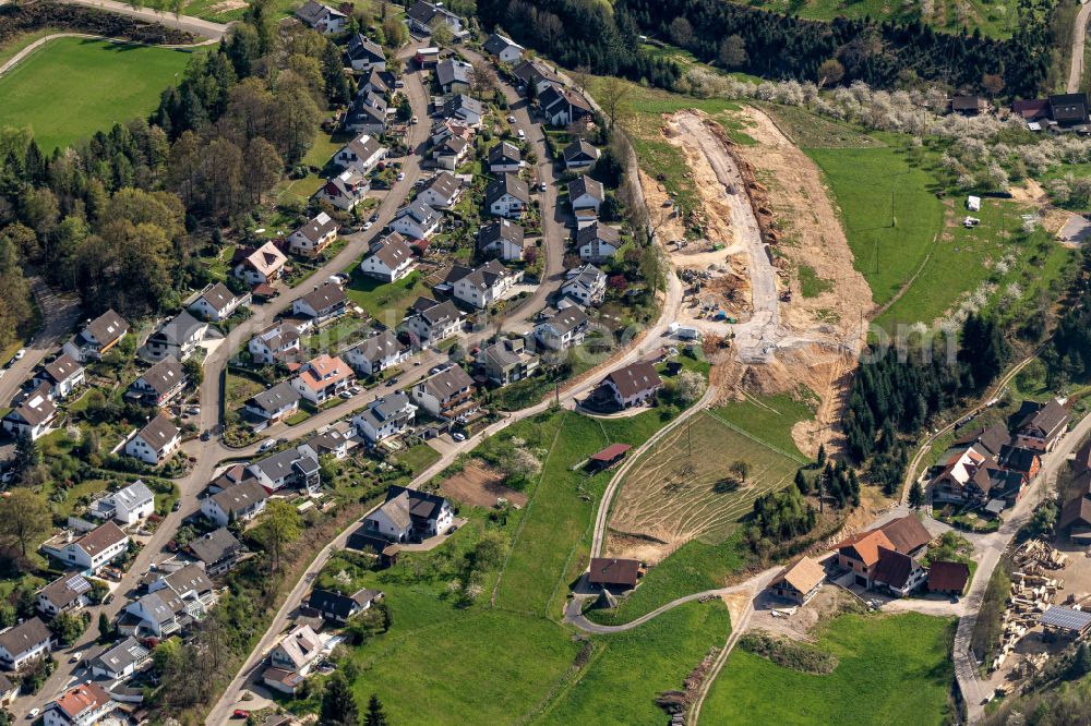 Ödsbach from above - Construction sites for new construction residential area of detached housing estate on street Bergstrasse in Oedsbach in the state Baden-Wuerttemberg, Germany