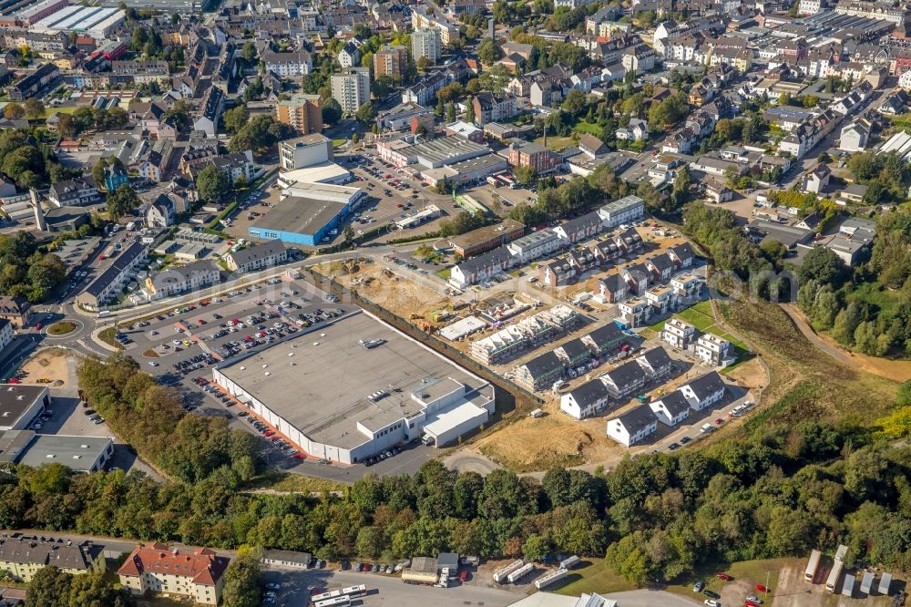 Velbert from the bird's eye view: Construction sites for new construction residential area of detached housing estate on the former Woeste-terrain in Velbert in the state North Rhine-Westphalia. The development is carried out by the companies: Ten Brinke and Deutsche Reihenhaus