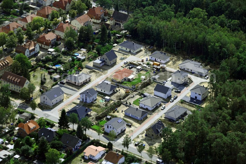 Aerial photograph Beelitz - Construction sites for new construction residential area of detached housing estate on Eulenweg in Beelitz in the state Brandenburg, Germany