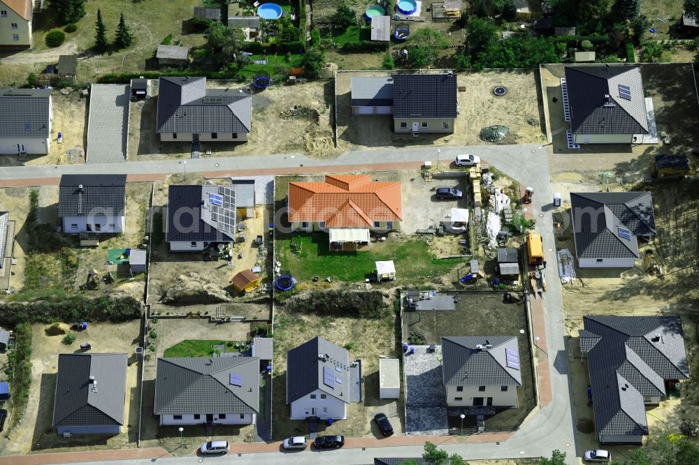 Beelitz from the bird's eye view: Construction sites for new construction residential area of detached housing estate on Eulenweg in Beelitz in the state Brandenburg, Germany