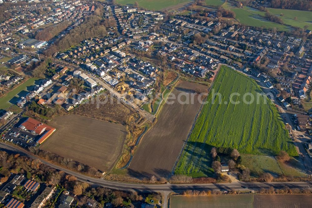 Bottrop from above - Construction sites for new construction residential area of detached housing estate Hackfurthstrasse - Dorfheide - Rentfortstrasse in the district Kirchhellen in Bottrop in the state North Rhine-Westphalia