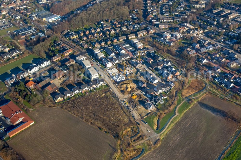 Bottrop from the bird's eye view: Construction sites for new construction residential area of detached housing estate Hackfurthstrasse - Dorfheide - Rentfortstrasse in the district Kirchhellen in Bottrop in the state North Rhine-Westphalia