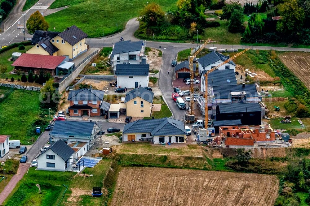 Wallburg from the bird's eye view: Construction sites for new construction residential area of detached housing estate Heiligenhaeusle in Wallburg in the state Baden-Wurttemberg, Germany