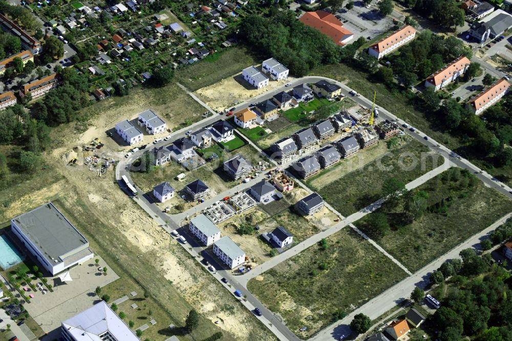 Aerial photograph Stahnsdorf - Construction sites for new construction residential area of detached housing estate on Heinrich-Zille-Strasse in Stahnsdorf in the state Brandenburg, Germany