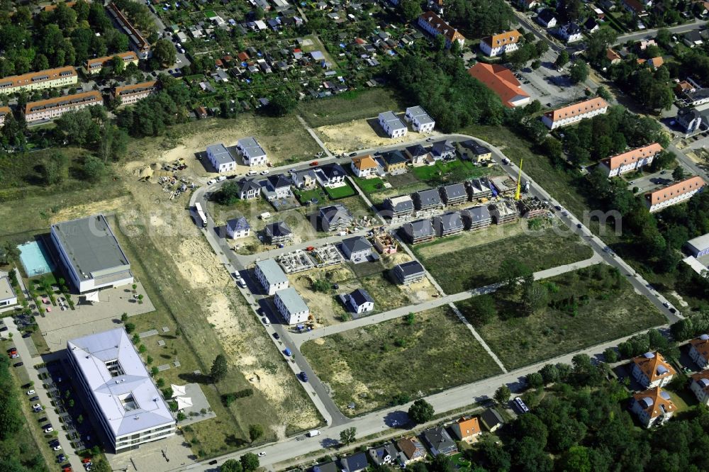 Stahnsdorf from above - Construction sites for new construction residential area of detached housing estate on Heinrich-Zille-Strasse in Stahnsdorf in the state Brandenburg, Germany