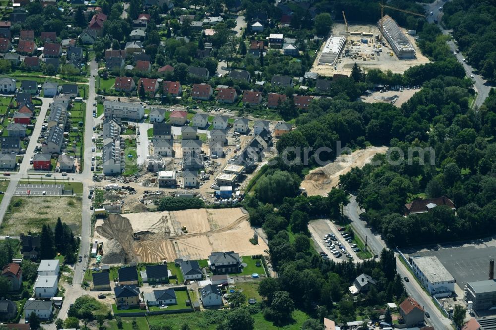 Berlin from the bird's eye view: Construction sites for new construction residential area of detached housing estate Hermineweg - Theodorstrasse in the district Mahlsdorf in Berlin, Germany