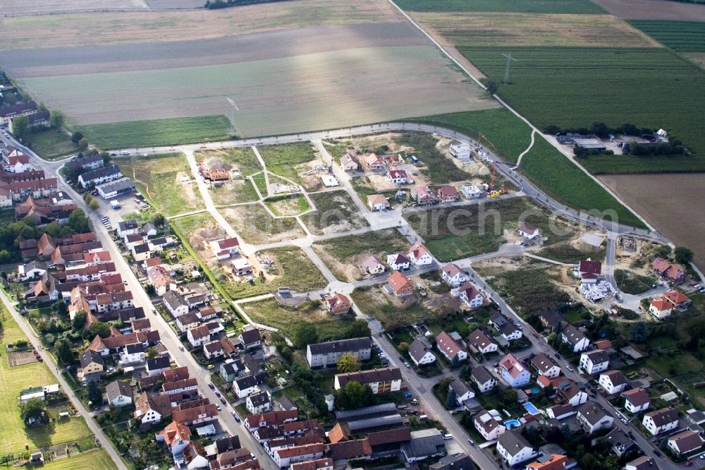 Kandel from the bird's eye view: Construction sites for new construction residential area of detached housing estate Am Hoehenweg in Kandel in the state Rhineland-Palatinate