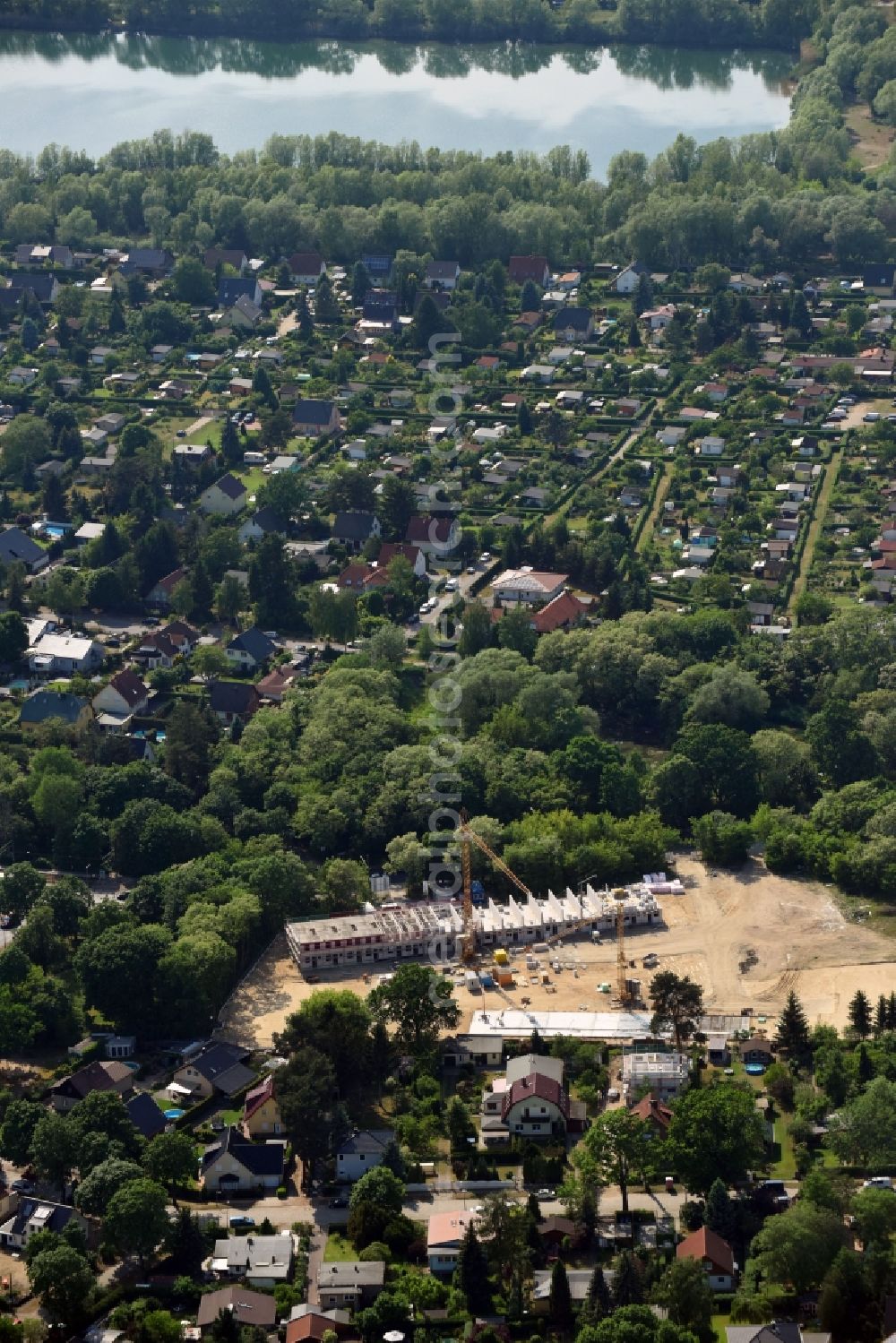 Berlin from the bird's eye view: Construction sites for new construction residential area of detached housing estate on Hultschiner Damm in the district Mahlsdorf in Berlin, Germany