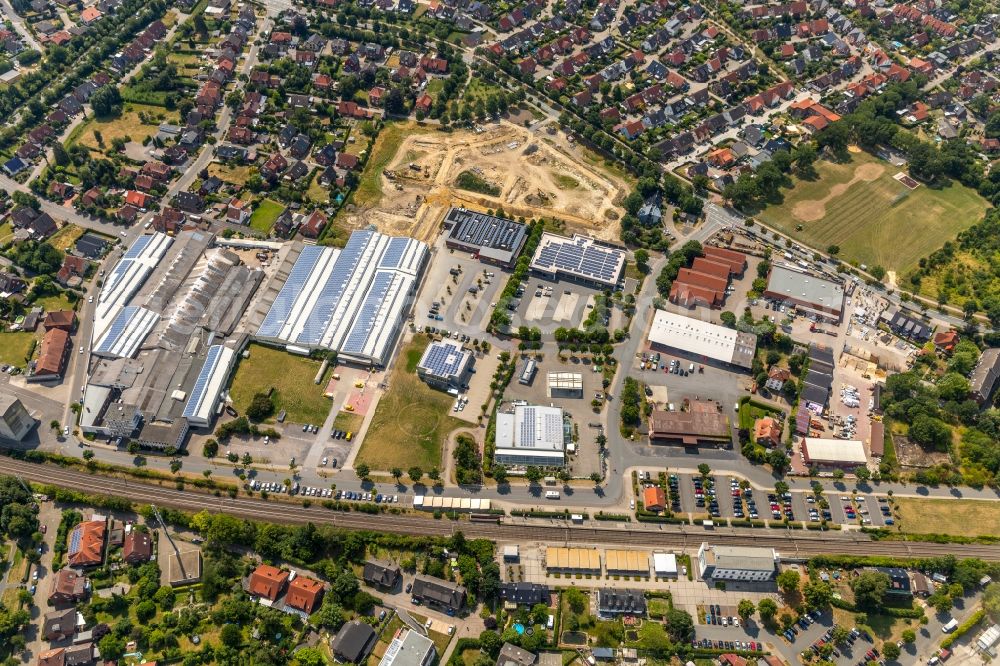 Drensteinfurt from the bird's eye view: Construction sites for new construction residential area of detached housing estate on Konrad-Adenauer-Strasse in Drensteinfurt in the state North Rhine-Westphalia, Germany