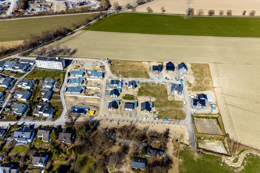 Schmallenberg from above - Construction sites for new construction residential area of detached housing estate Auf dem Loh in the district Obringhausen in Schmallenberg at Sauerland in the state North Rhine-Westphalia, Germany