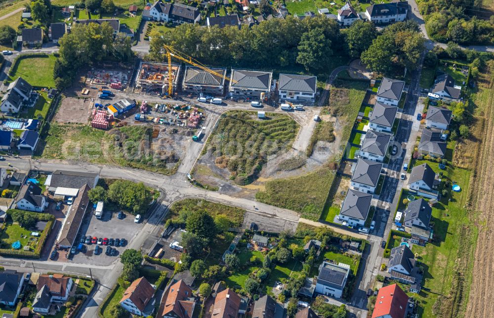 Aerial photograph Menden (Sauerland) - Construction sites for new construction residential area of detached housing estate in Menden (Sauerland) in the state North Rhine-Westphalia, Germany