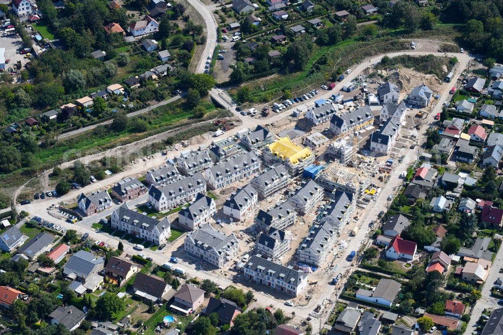 Aerial image Berlin - Construction sites for new construction residential area of detached housing estate Moewenweg - Gruene Aue in the district Biesdorf in Berlin, Germany