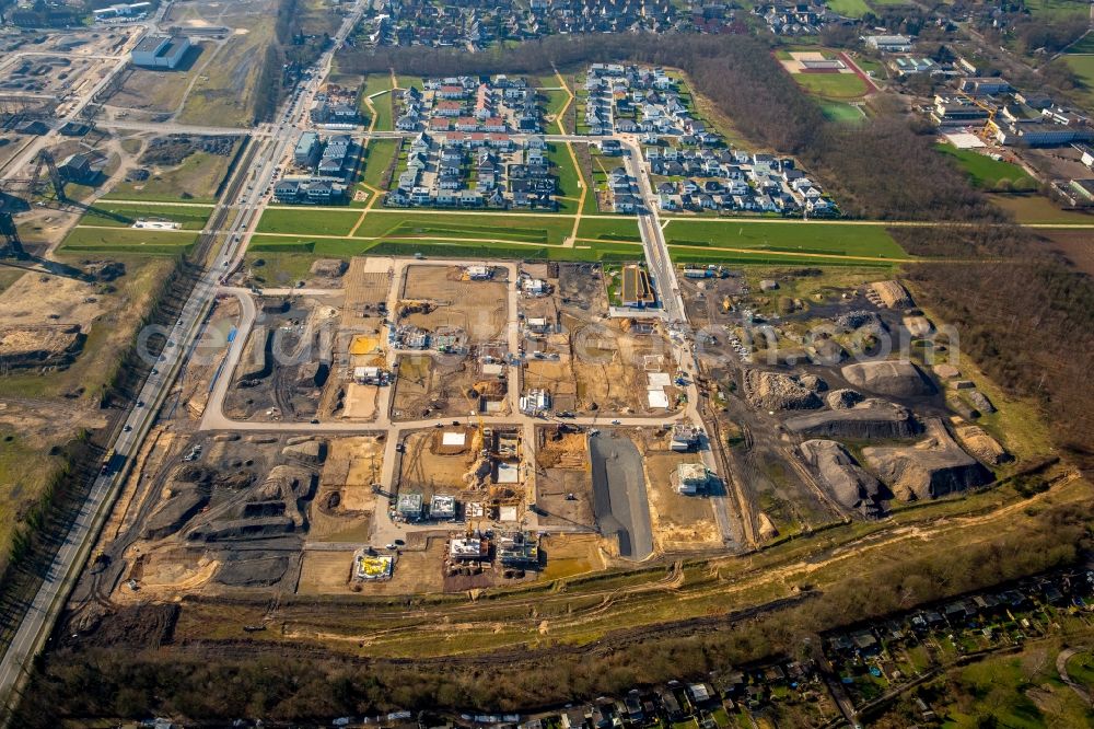 Neukirchen-Vluyn from the bird's eye view: Construction sites for new construction residential area of detached housing estate Dicksche Heide on Niederrheinallee in Neukirchen-Vluyn in the state North Rhine-Westphalia