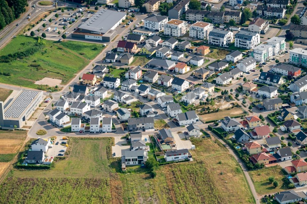 Kenzingen from the bird's eye view: Construction sites for new construction residential area of detached housing estate North in Kenzingen in the state Baden-Wurttemberg, Germany