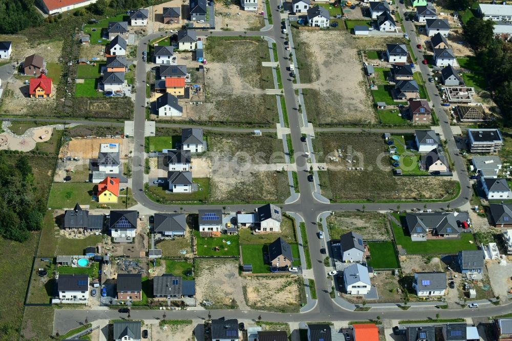 Aerial image Wustermark - Construction sites for new construction residential area of detached housing estate Glockenheidering - Schneeheidering - Heidelerchenallee in the district Elstal in Wustermark in the state Brandenburg, Germany